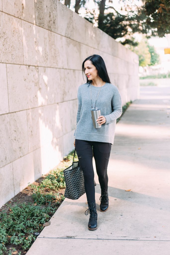 Athleta Habitat sweater and Highline Hybrid Leggings worn together are a cozy chic outfit for a Thanksgiving gathering!